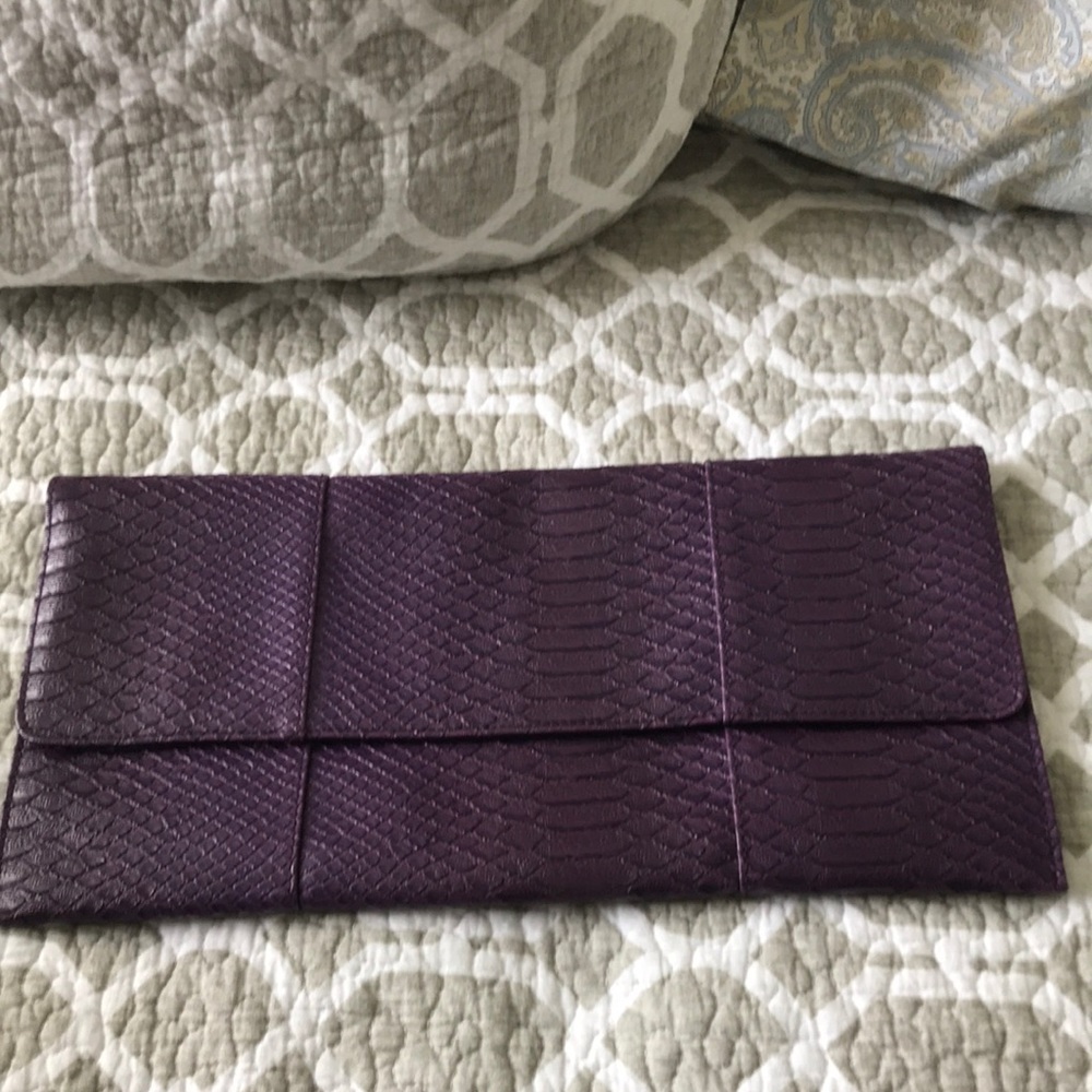 Purple snake patterned clutch